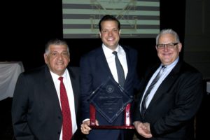 Lyons Village President Christopher Getty was named 2016 Man of the Year by the Illinois State Crime Commission for his efforts in passing the local Gun legislation which has become the basis for the Intergovernmental Agreement (IGA) on guns sales between Lyons and Cook County government. Picture (from left) Lyons Trustee Greg Ramirez, Lyons Village President Christopher Getty, and Lyons Trustee Dan Hilker. Photo courtesy Village of Lyons.