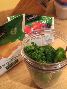 Preparing to mix the Kale in the NutriBullet blender.