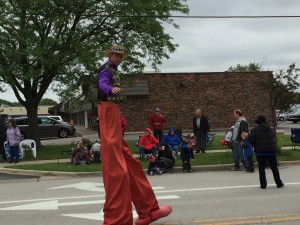 Man on stilts walking the entire length of the parade. That's not easy!